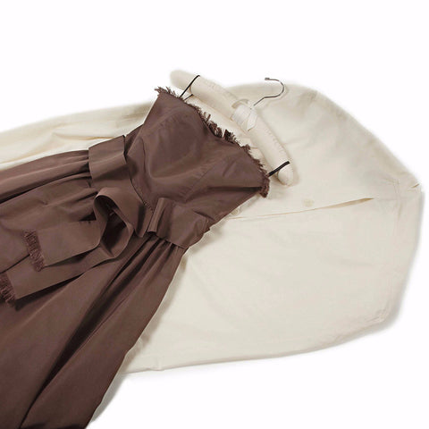 Cotton Gown & Dress Garment Bags With A Brown Dress Lying On Top