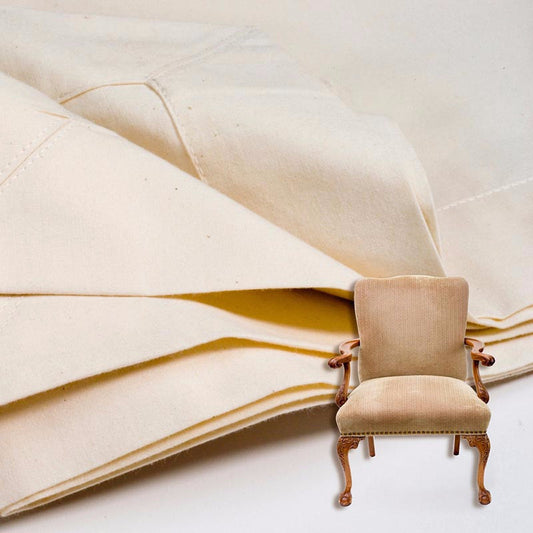 A Cotton Dust Cover With A Beige Armchair In The Foreground
