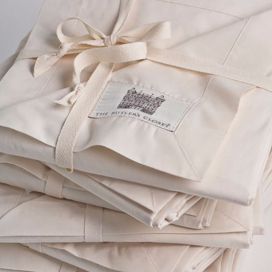 A Stack Of Cotton Furniture Dust Covers