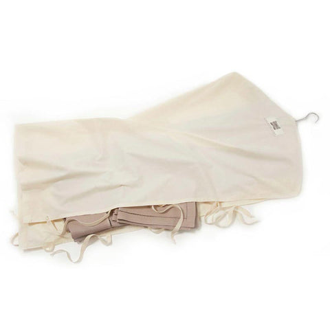 A Cotton Linen Care Bag From The Butler's Closet With Some Tablecloths Sticking Out